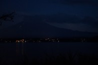 Trail of lights going up Mt Fuji.