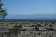 View from car approaching Issyk Kul Lake