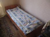 At hotels & guest houses in Kazakhstan something strange happens. They come and carefully 'unmake' your bed every day. Anything above the bottom sheet needs to be carefully folded so it does not fall over the side at all. This means you have to then make your bed each night so that you can sleep in it !